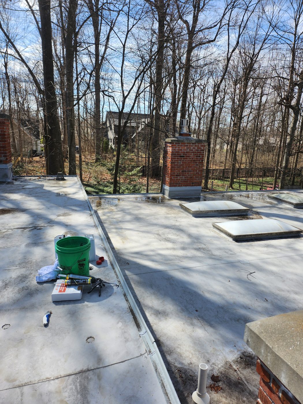 Old weathered flat roof before EPDM installation